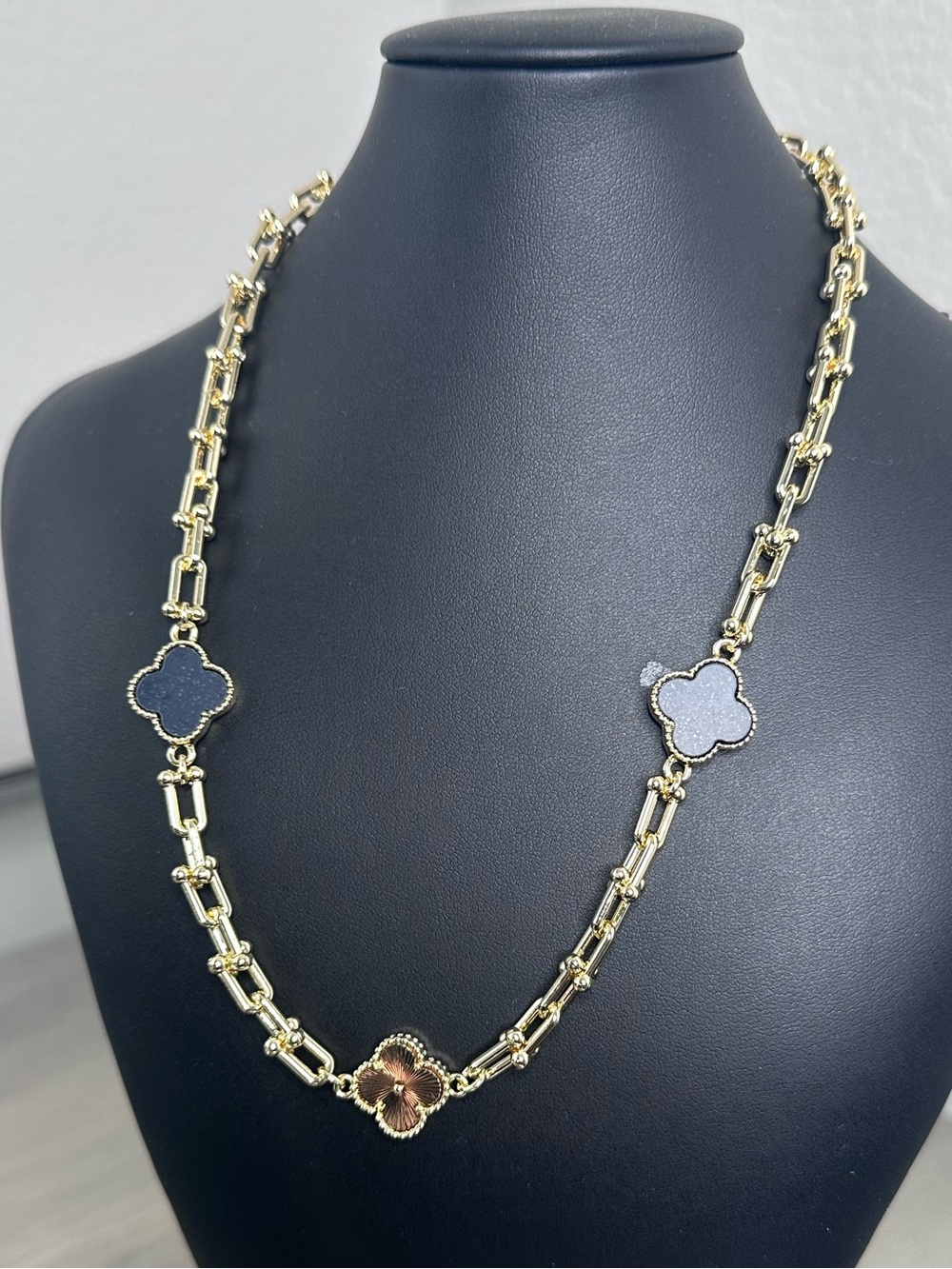 Gold-Filled Chain Necklace with Black and Gold Clover Accents